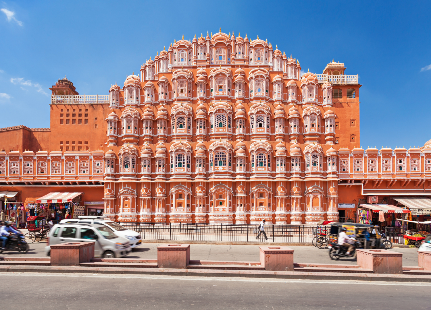 An ornate pink multi-story building in Jaipur