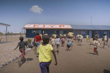 Kids running to school with new Climatile Roof